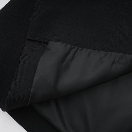 Mariangela Black Oversize Bow Tie Blazer with Peak Lapels and Cut-Out Design