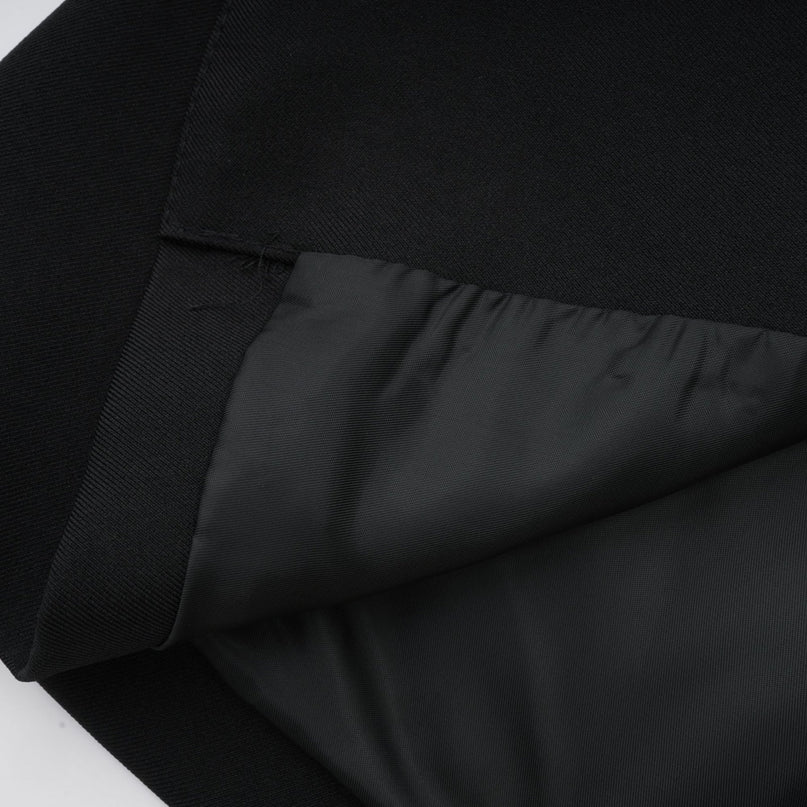 Mariangela Black Oversize Bow Tie Blazer with Peak Lapels and Cut-Out Design