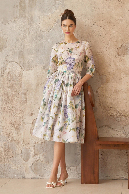 Marta Midi Dress in Neutrals floral print shirred effect flounce hem cinched waist half sleeves rear zip fastening 79% Terylene fiber 21% Silk