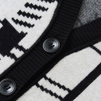 Mary wearing black and white plaid cardigan sweater with V-neckline and full sleeves for fall streetwear or casual outings