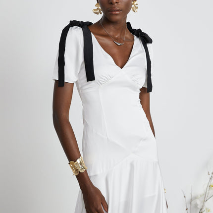 Mary White and Black Maxi Dress with V-Neck and Puff Sleeves 100% Polyester Ribbon Design Pleat Detailing Bowknot Embellishment Flared Hem Rear Zip Fastening