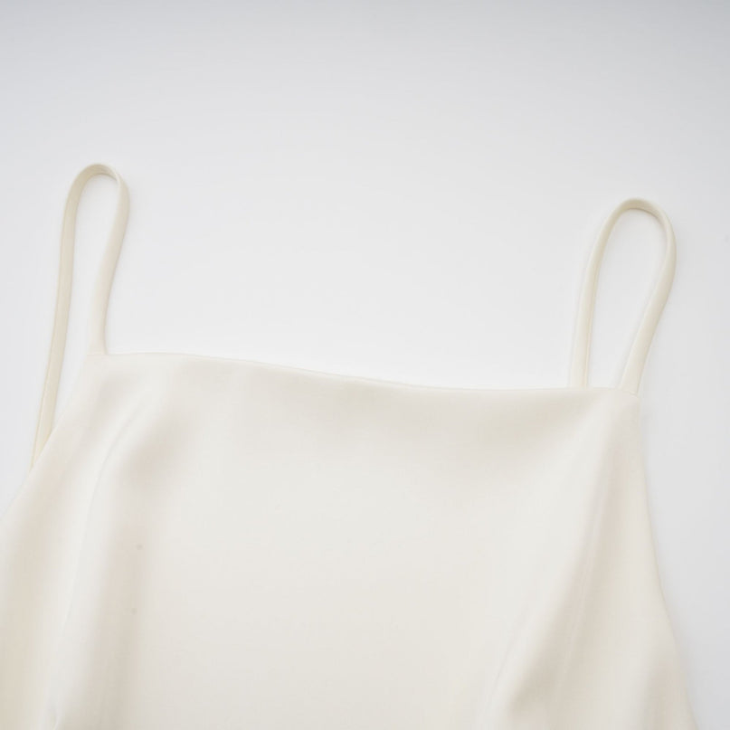 Mattea White Mini Dress with Spaghetti Straps and Open Back Design