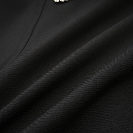 Mealla black crystalbutton flared mini dress