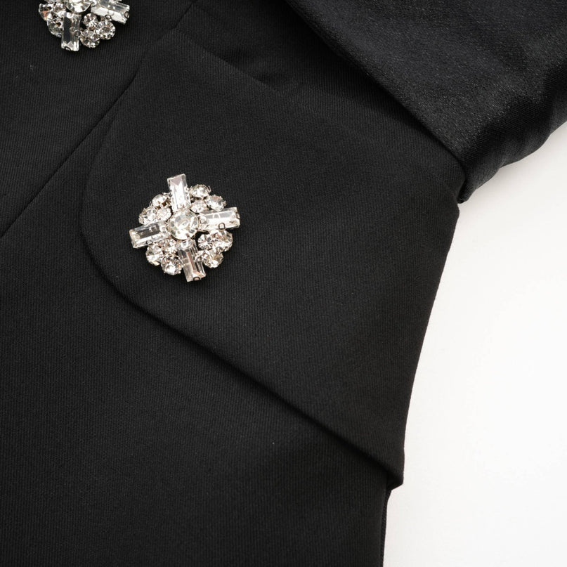 Mealla black crystalbutton flared mini dress