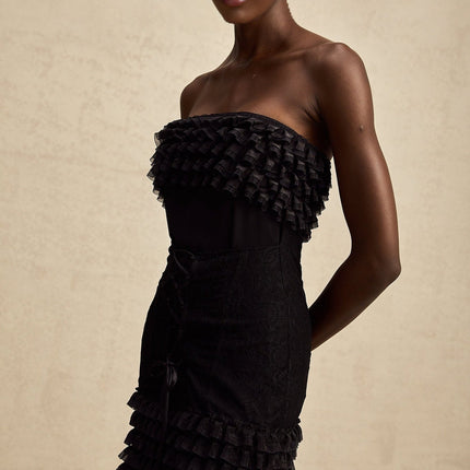 Michèle Black Strapless Mini Dress with Lace-up Detail and Tiered Frill Accents