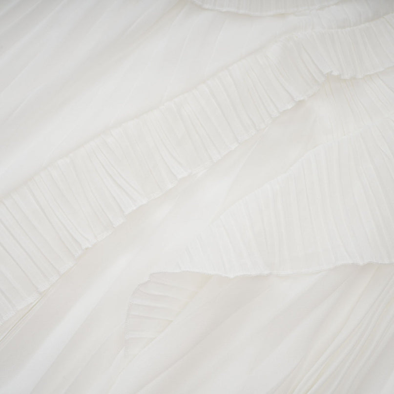 Millie White Halterneck Midi Dress with Ruffled Trim and Asymmetrical Design