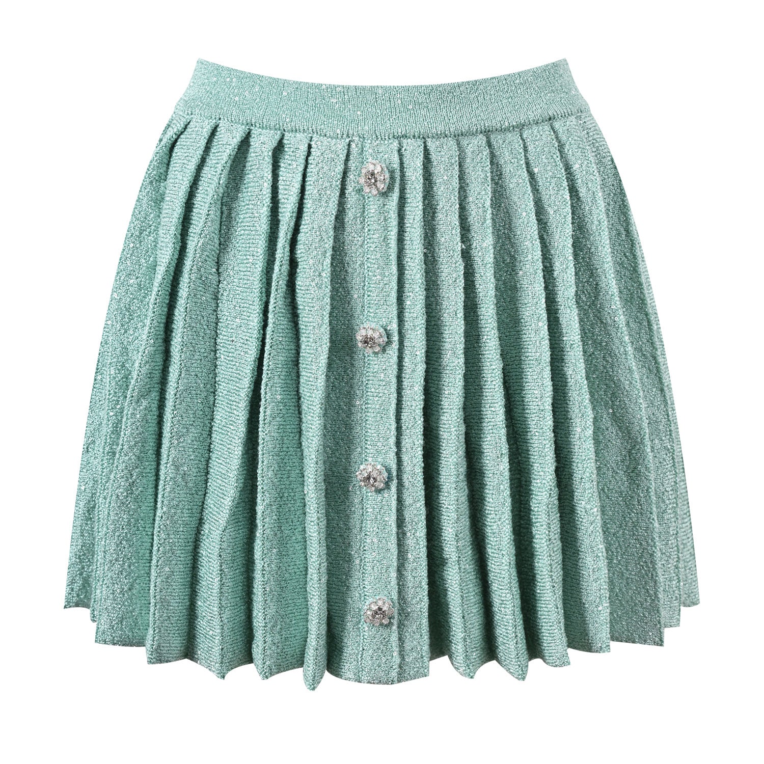 Mint green tweed jacket with floral embellishments paired with a pleated skirt, creating a chic and elegant look