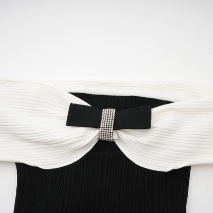 Miracle Mini Dress Black White Off Shoulder Crystal Bow Thigh Length Contrasting Colors Shimmering Crystal Embellishments Knitted Construction Model Size M Sophistication 51 Viscose 35 Terylene 13 Nylon 2 Elastane Comfort Flattering Fit Special Occasion