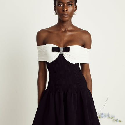Miracle Mini Dress in Black & White off-shoulder design with crystal bow