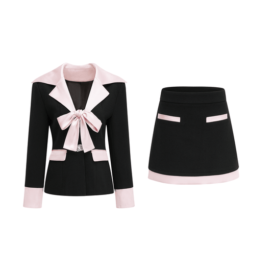 Tweed jacket with notched lapels cinched waist and front bowknot detailing in black styled with contrast colors paneling and two front pockets