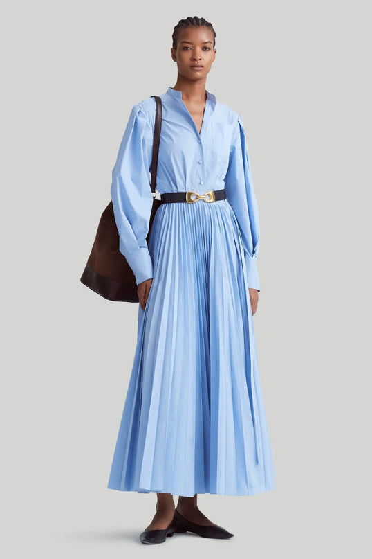 Giana wearing Modisches Blue Dress ankle-length masterpiece lapel neckline natural waist full sleeves striped pattern luxurious blend of cotton and polyester Italian craftsmanship European charm style exquisite creation
