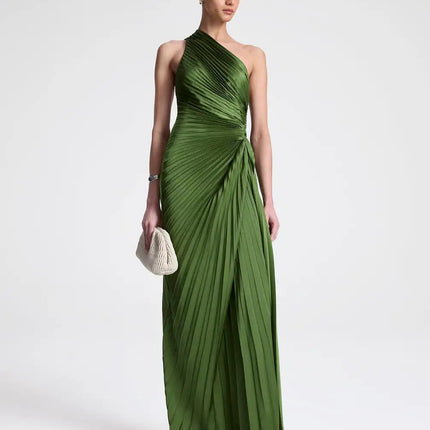 Rosanna wearing modisches green dress Italian luxury polyester fabric stand neckline sheath silhouette contemporary allure timeless design