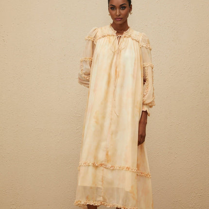 Monica Midi Dress in Neutrals Multicolor Tie-Dye Ruffle Trim Smocked Panel Dolman Sleeves Self-Tie Detail Shirred Effect Slip-On Style Midi Length 100% Terylene Fiber