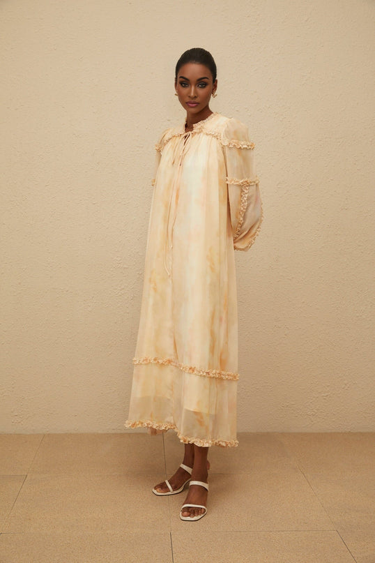 Monica Midi Dress in Neutrals Tie-Dye Ruffle Trim Smocked Panel Almond Beige Dolman Sleeves Self-Tie Detail Shirred Effect Contemporary Woman Slip-On Style Midi Length Terylene Fiber