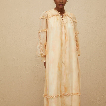 Monica Midi Dress in Neutrals Tie Dye Ruffle Trim Smocked Panel Almond Beige Dolman Sleeves Self-Tie Detail Shirred Effect Contemporary Woman Slip-On Style Midi Length Terylene Fiber
