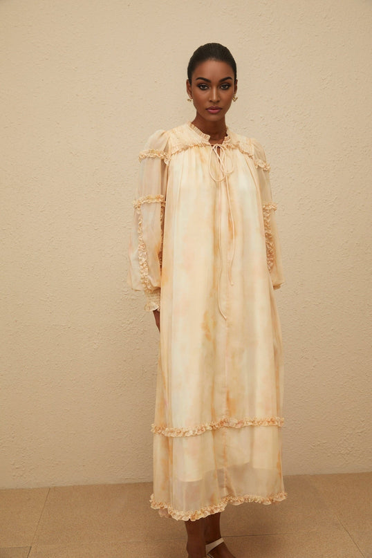 Monica Midi Dress in Neutrals Tie Dye Ruffle Trim Smocked Panel Almond Beige Dolman Sleeves Self-Tie Detail Shirred Effect Contemporary Woman Slip-On Style Midi Length Terylene Fiber