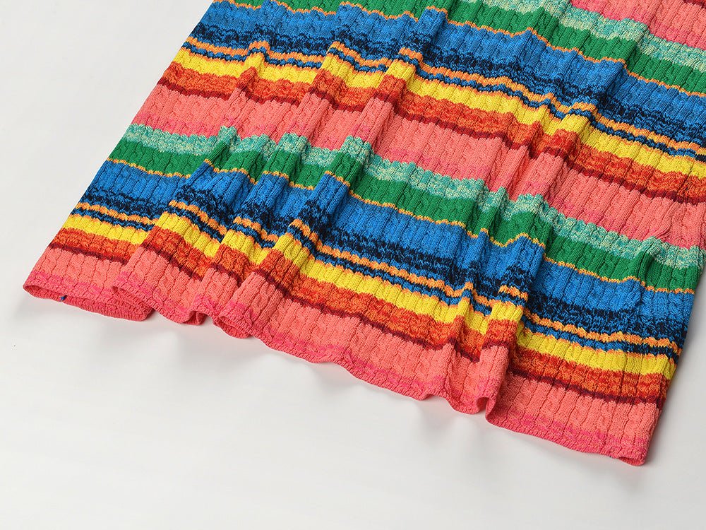 Multicolor striped bodycon dress in bright reds, greens, yellows, and blues