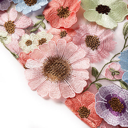 Multicolored floral embroidered A-line skirt with high-waist in soft pastel palette and vibrant accents