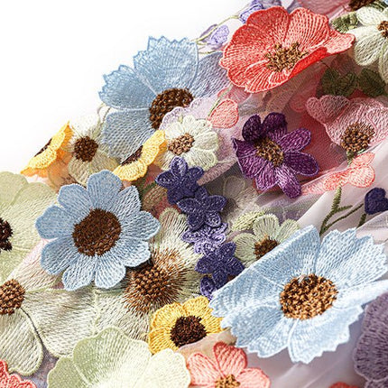 Multicolored floral embroidered A-line skirt in soft pastel palette with vibrant accents