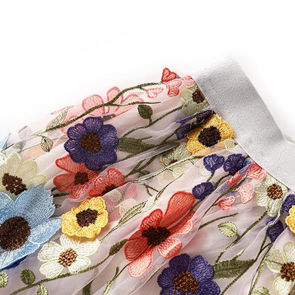 Multicolored floral embroidered A-line skirt in soft pastel palette with vibrant accents