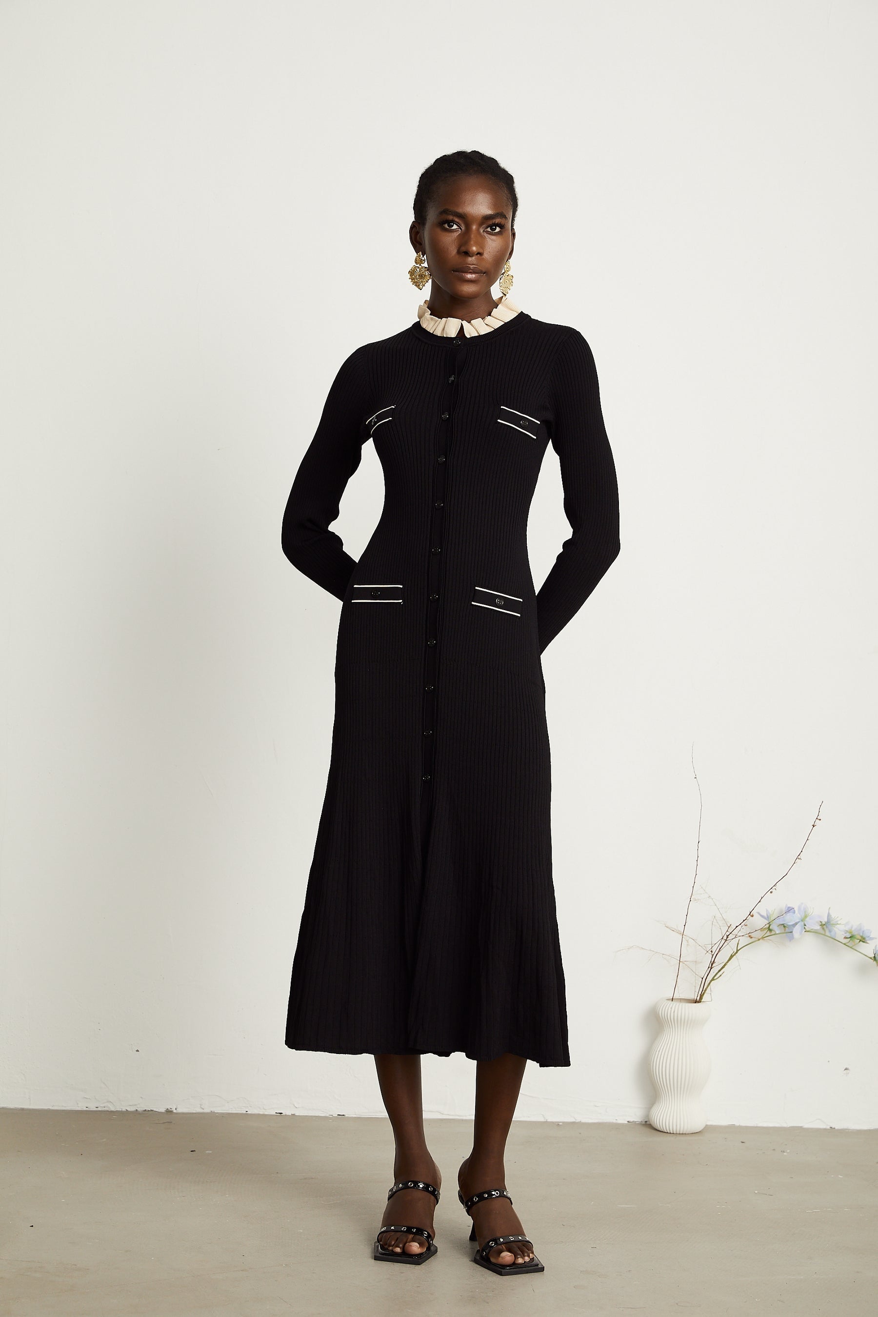 Nadège black ruffledneck knitted midi dress