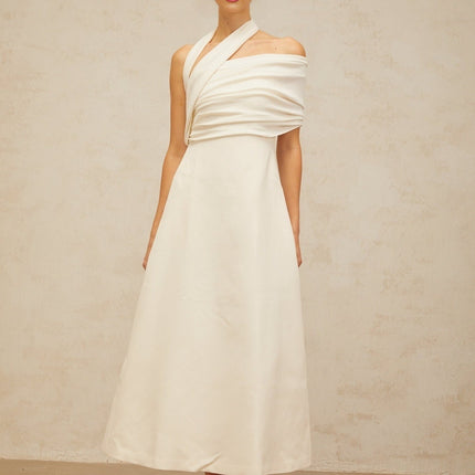 Nadia Cream White Maxi Dress with Asymmetric Halterneck Design and Flared Skirt