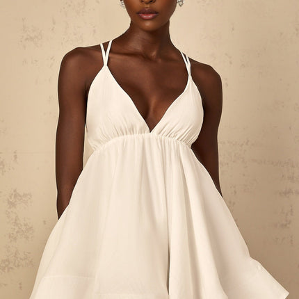 Natalia Mini Dress in White Shirred Flounce sleeveless V-neck asymmetrical hem Tencel Terylene self-tie cross-over straps slip-on thigh-length high-low silhouette