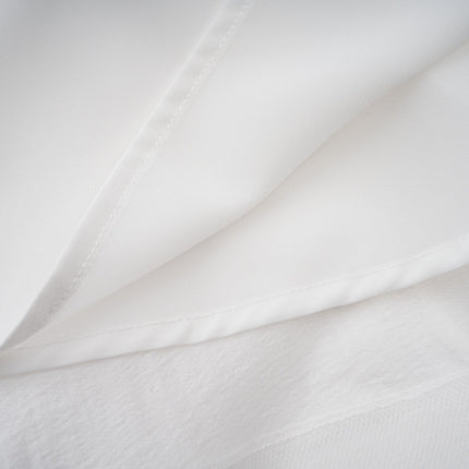 Natalia Mini Dress in White Shirred Flounce sleeveless V-neck asymmetrical hem Tencel Terylene self-tie straps upscale occasion thigh-length high-low silhouette