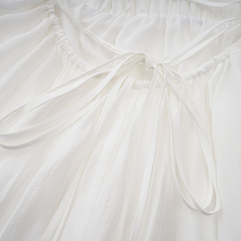 Natalia Mini Dress in White Shirred Flounce asymmetrical hem