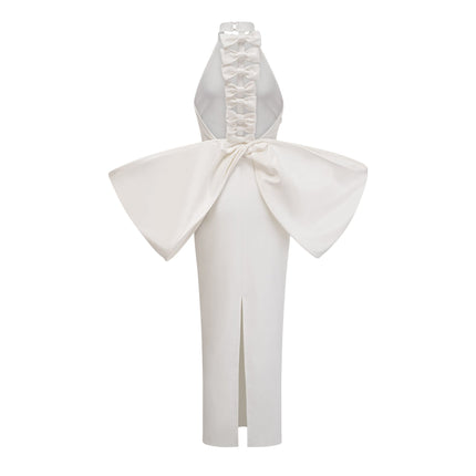 Natalia White Oversize-bow Maxi Dress with Rear Bowknot Detail crafted from 75% polyester and 25% spandex, featuring round neck, rear slit, size zip fastening, and open back design for effortless elegance and allure