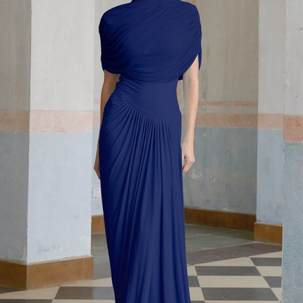 Navy blue asymmetric pleated maxi dress with Catherine design on model