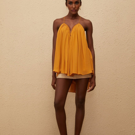 Embrace elegance in the Nemesis Ginger Pleated Chiffon Top in Orange color