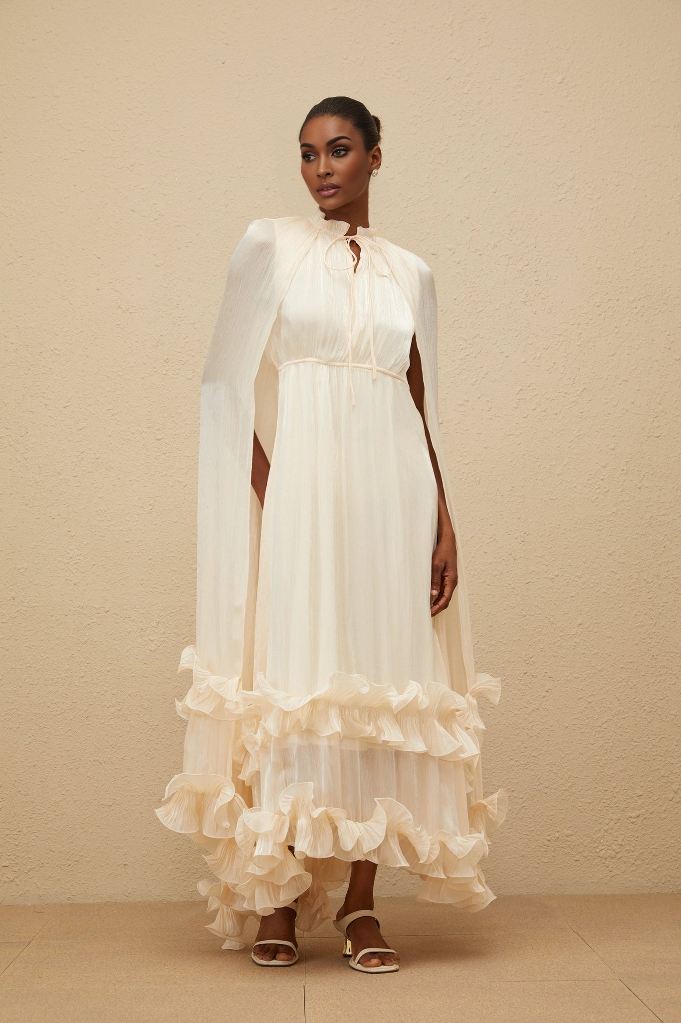 Neutrals Frilled Neck Sleeveless Cape Design Glossy Finish Layered Fully Pleated Ruffled Trim Side Zip Fastening Midi Length Dress