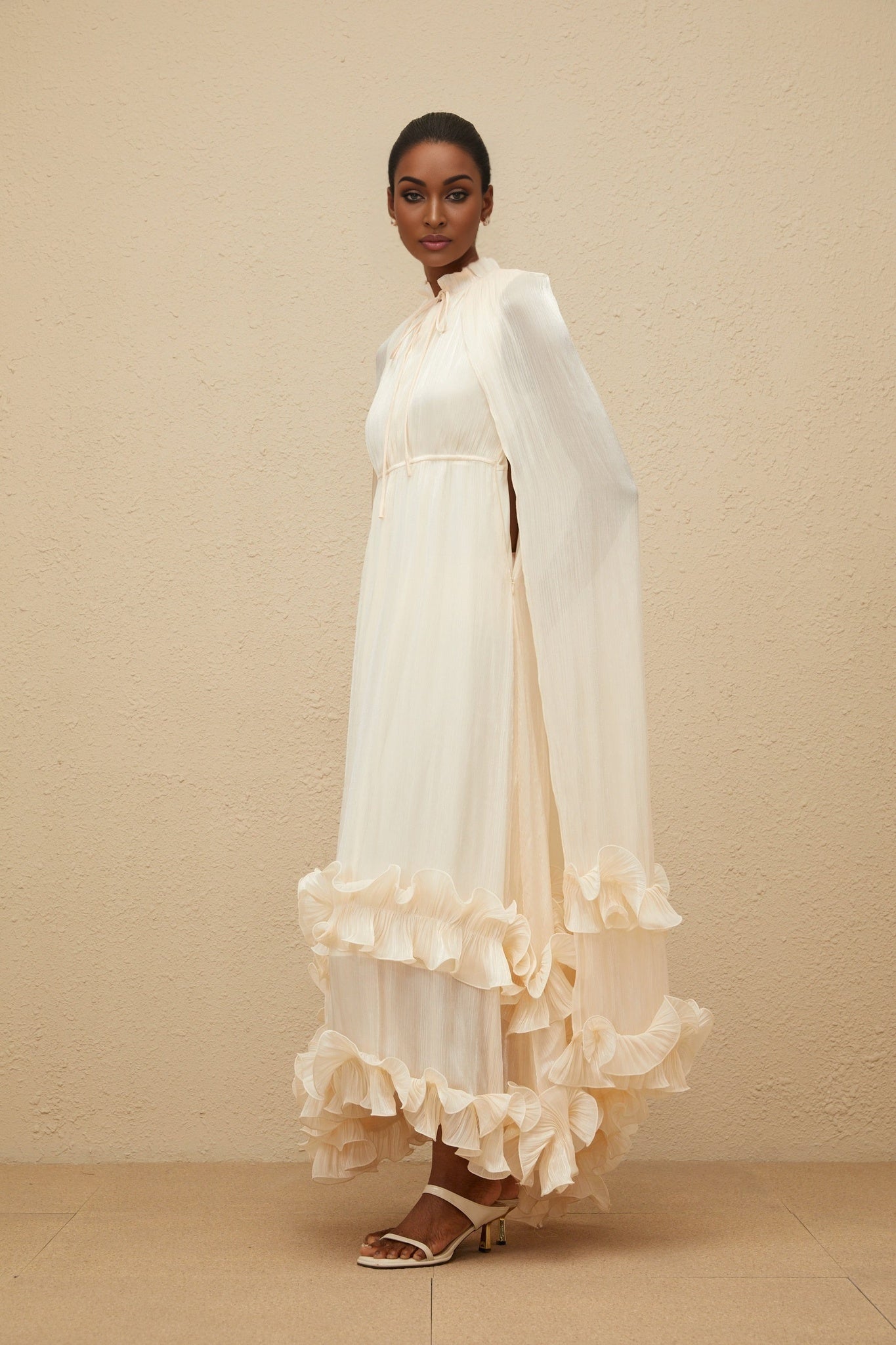 Neutrals Frilled Neck Sleeveless Cape Design Glossy Finish Layered Fully Pleated Ruffled Trim Side Zip Fastening Midi Length Dress