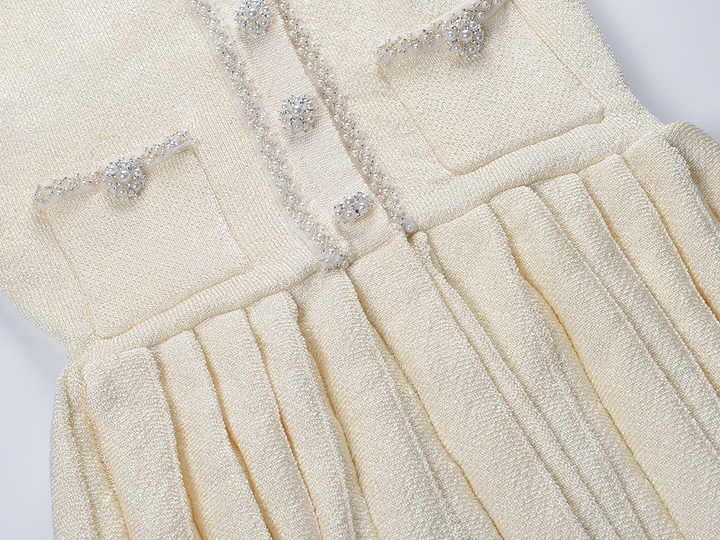 Neutrals tweed dress with crystal-embellished buttons and decorative bow detail
