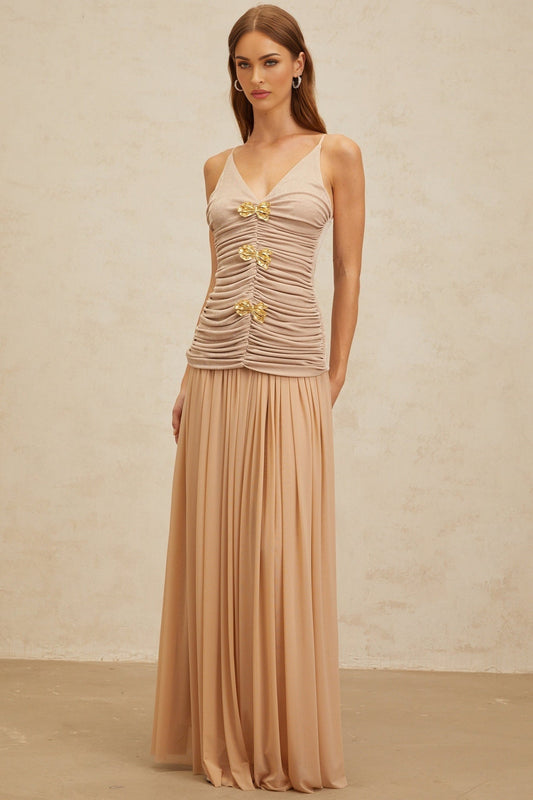 Neutrals V-neck sleeveless top with brooch and ruched detailing and adjustable spaghetti straps, paired with pleated maxi skirt in Neutrals made of 100% Terylene fiber