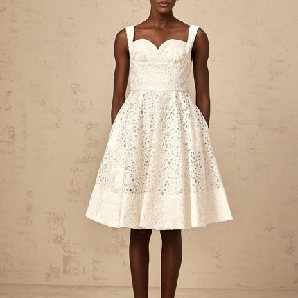 Nicolette white midi dress with delicate floral lace pattern and feminine silhouette