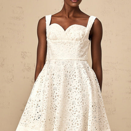 Nicolette white midi dress with floral lace pattern and feminine silhouette