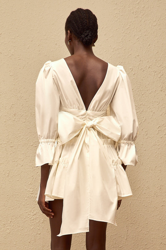 Ninfa White A-Line Mini Dress with Ruffled Trim and Bowknot Detail