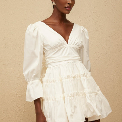 Ninfa White A-line Mini Dress with Ruffled Trim and Oversized Bowknot Detail
