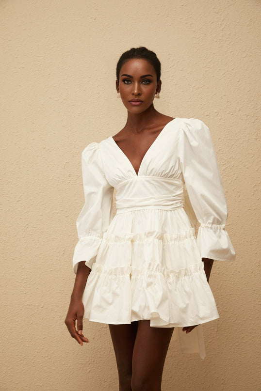 Ninfa White A-Line Mini Dress with Ruffled Trim and Bowknot Detail
