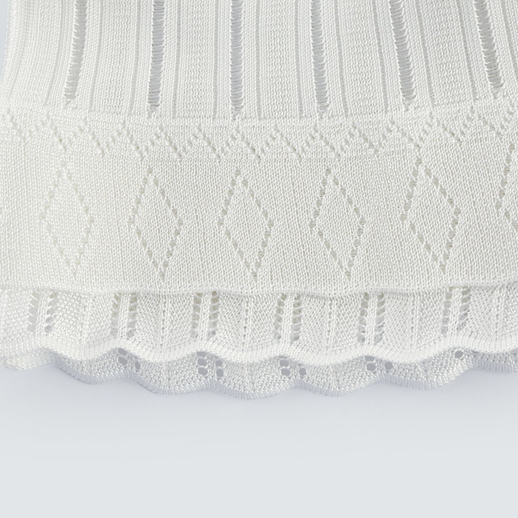 Noémie white cutout pleated mini dress