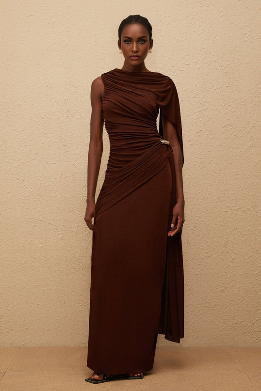 Nora Maxi Dress in Brown Sleeveless Bateau Neck Knitted Construction Ruched Detailing Ribbon Design Silver-tone Hardware Side Zip Fastening Maxi Length