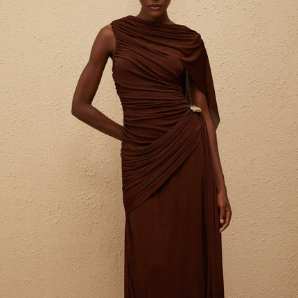 Nora Maxi Dress in Brown Sleeveless Bateau Neck Fitted Waistline Knitted Ruched Detailing Ribbon Design Silver-tone Hardware Side Zip Fastening Maxi Length