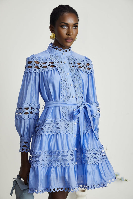 Nova Blue Cut-out Lace Mini Dress 100% Acetate Fiber High-neck Silhouette Flared Cuffs Decorative Waistbelt Flared Mini Skirt Front Button Closure Pearl-like Buttons Intricate Embroidery Delicate Lace Accents Garden Parties Spring Occasions Daytime Events Luxury Sophistication Elegance Femininity Modern Woman