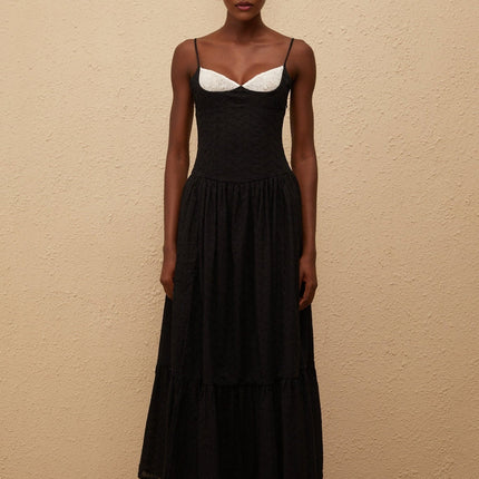 Octavia Maxi Dress in Black with White Embroidered Corset and Lace Panelling V-Neck and Adjustable Straps Pleated Bodice Flounce Hem and Side Slit 100% Terylene Fiber Side Zip and Lace-Up Closure