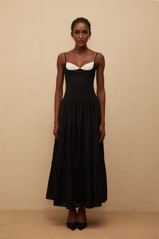 Octavia Maxi Dress in Black with White Embroidered Corset and Lace Panelling V-Neck and Adjustable Straps Pleated Bodice Flounce Hem and Side Slit 100% Terylene Fiber Side Zip and Lace-Up Closure