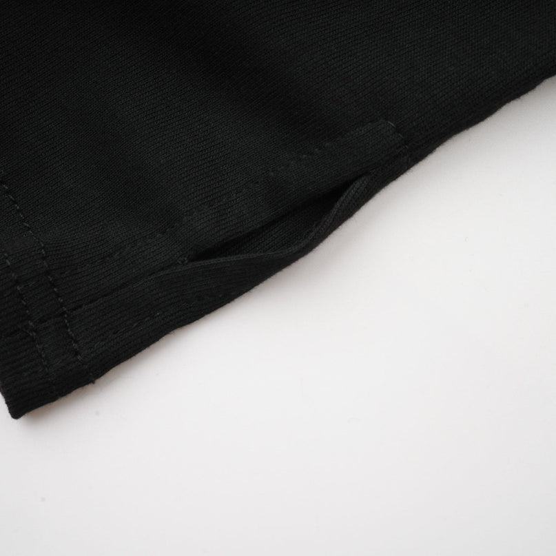 Ofelia Black Jersey Halterneck Top with Metal Buckle Detailing and Ruched Design