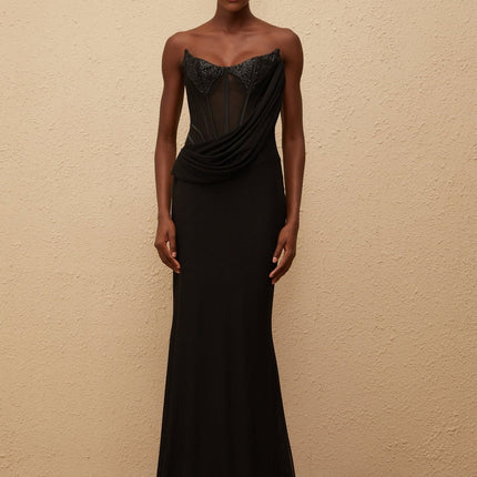 Ofelia Maxi Dress in Black with boned corset bodice, sequin embellishments, ruched detailing, and flared hem