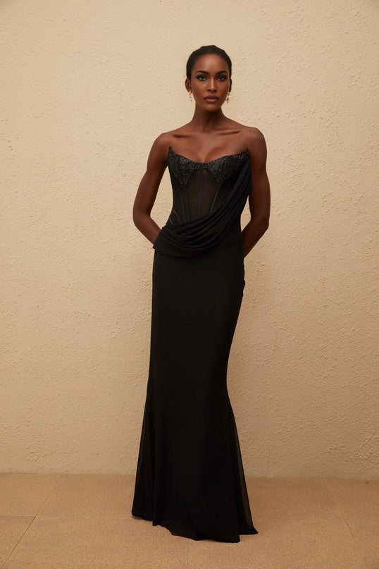 Ofelia Maxi Dress in Black off-the-shoulder boned corset bodice panelled design sequin embellishments ruched detailing fitted waistline flared hem rear zip fastening Terylene fiber special occasions glamour sophistication elegance